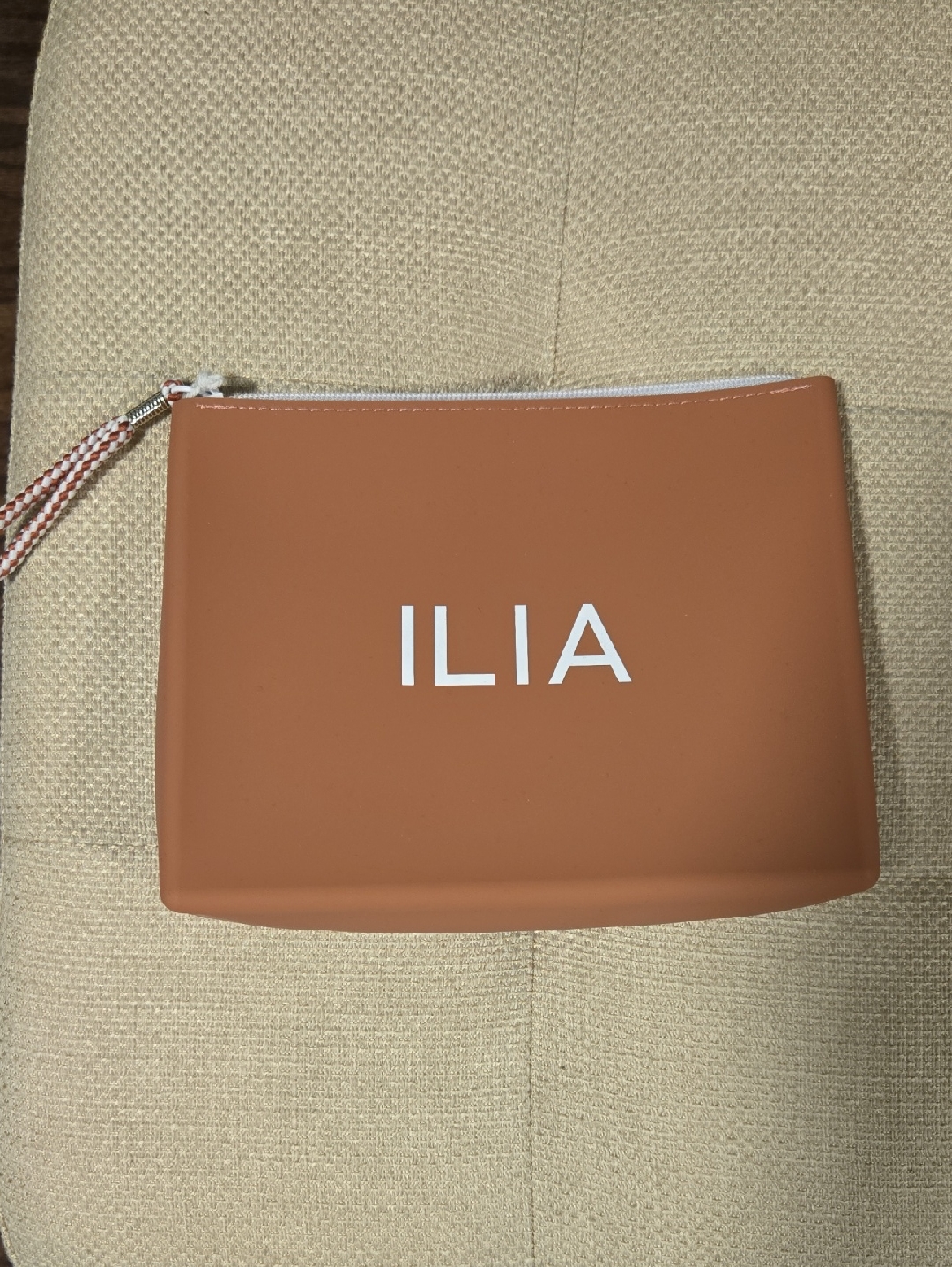 Ilia Terracotta Silicone Cosmetic Pouch With White Logo